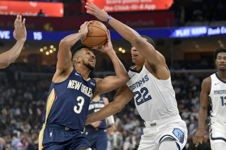 CJ McCollum and Zion Williamson lead Pelicans past Grizzlies 111-104 in season opener