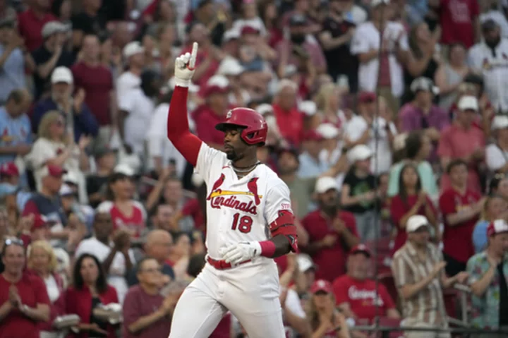 Walker homers to back Montgomery, Cardinals beat Reds 7-4