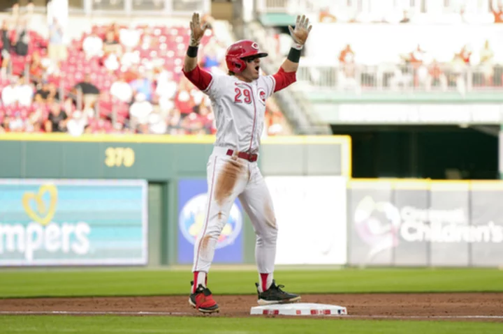 Joey Votto homers as Cincinnati Reds beat Miami Marlins 5-2 to stop 6-game slide