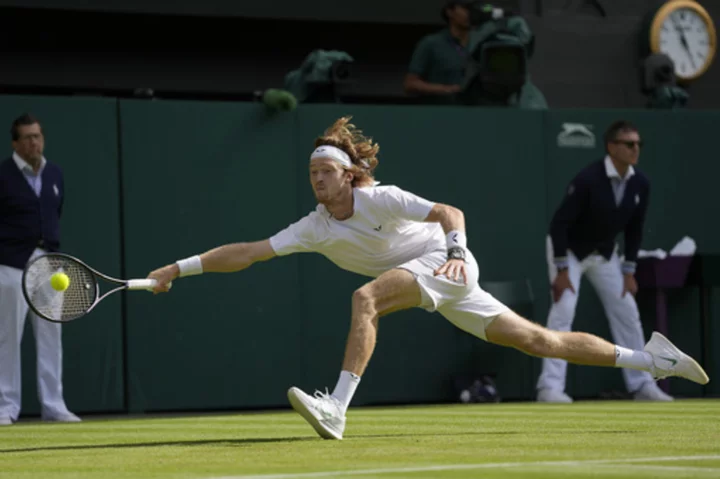 Andrey Rublev gets to the ball and sets up the win to reach Wimbledon quarterfinals