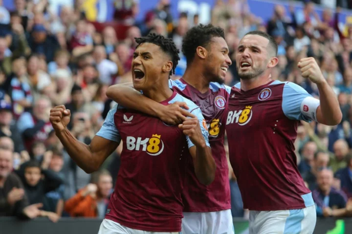 Watkins treble fires Villa's rout of hapless Brighton