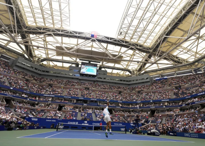 Two roofs at the US Open were partially shut because of rising heat and humidity