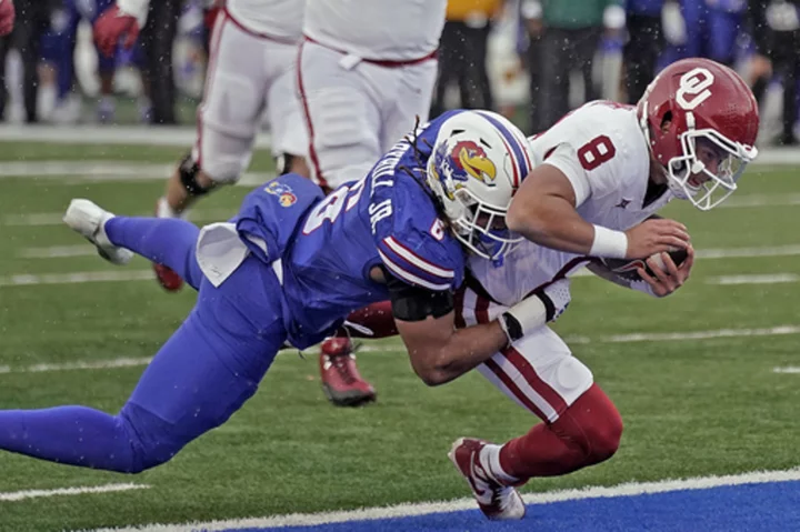 Neal scores go-ahead TD with 55 seconds left, KU holds on to beat No. 6 Oklahoma 38-33