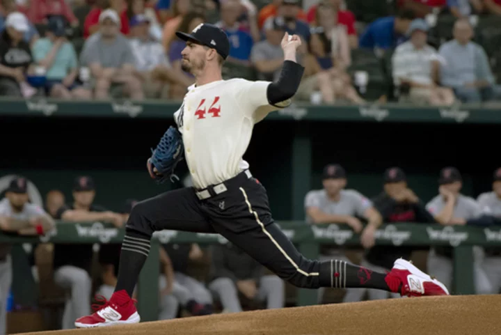 Heaney and Semien rebound from recent struggles and help Rangers beat Guardians 2-0