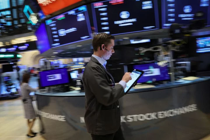 Wall Street set to open higher, European shares boosted by debt deal hopes