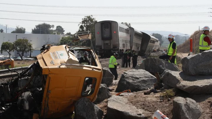 Passenger Amtrak train derails after hitting truck in California