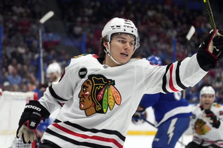 Top draft pick Connor Bedard's 2 goals, 2 assists help Blackhawks snap an 8-game losing streak